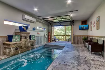 smoky oasis is one of the top Gatlinburg cabins with indoor private pools